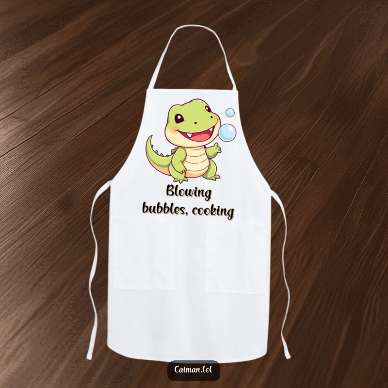 Funny apron showing a cheerful, toothy reptile with a stubby tail playfully snapping at a tiny floating bubble, making kitchen duties a joy.