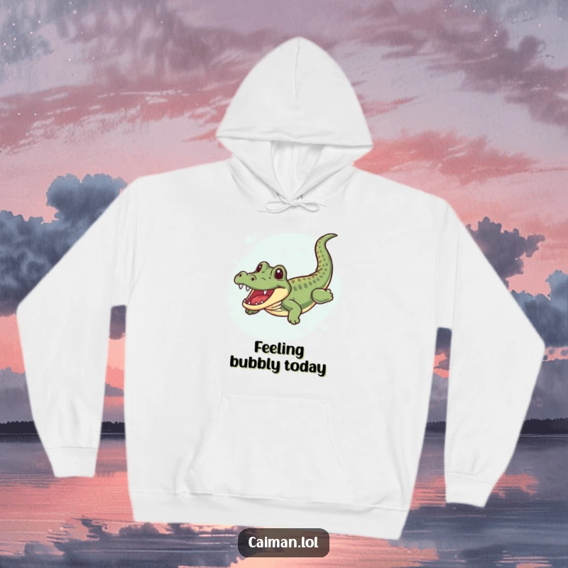 Funny Caiman Hoodie, a warm garment featuring a caiman with a joyful wiggle, swimming happily through bubbly, clear water, embodying aquatic fun.