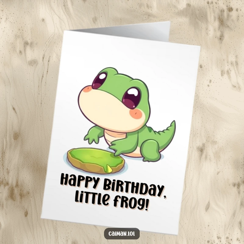 Funny Free Printable Birthday Card: Chubby reptile with big eyes lunging playfully at a lily pad, ideal for a funny DIY gift.