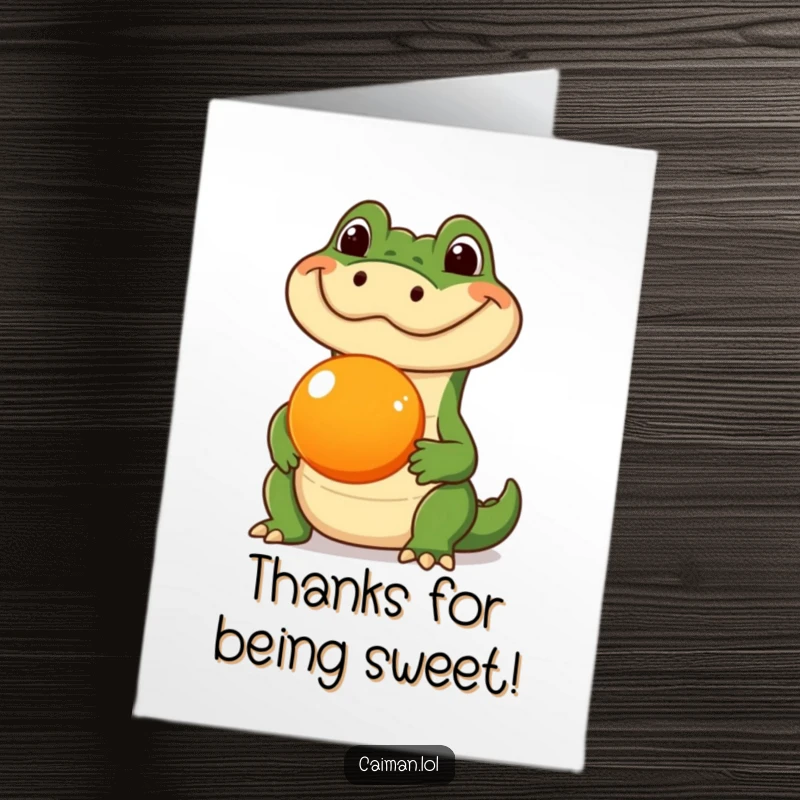 Funny Free Printable Thank You Card: Caiman humorously balancing an orange fruit on its snout, unique thanks.